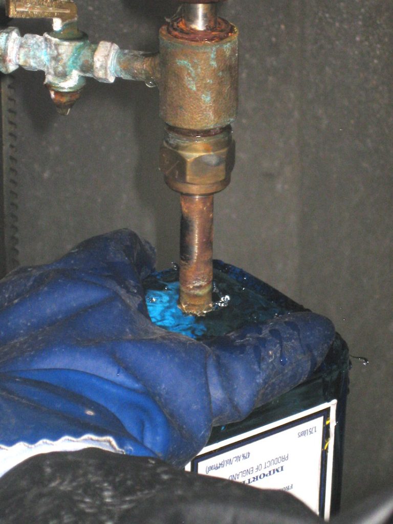 bottle being drilled